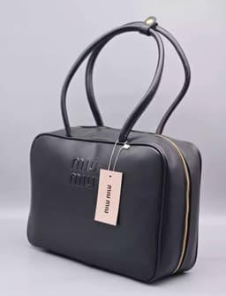 Сумочкa miu miu 