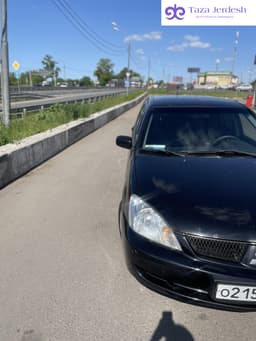 Лансер 1.6 автомат универсал
